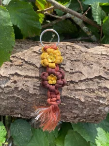 Accessoires au poil animaux fait main, fabrication en Normandie, porte-clé 2 fleurs chocolat et caramel